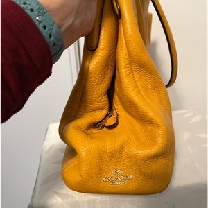 Mustard yellow Coach bag, great for Fall